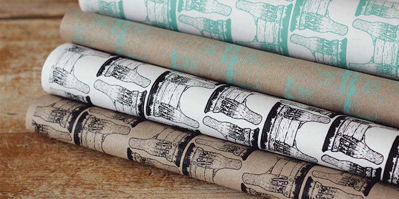 Gift wrap wrapping paper hand screenprinted using 100% waterbased inks on recycled paper by GET A GRIP Studio